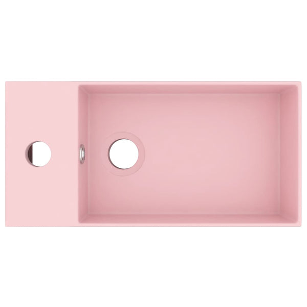 Kylpyhuoneen pesuallas ylivuodolla keraaminen matta pinkki