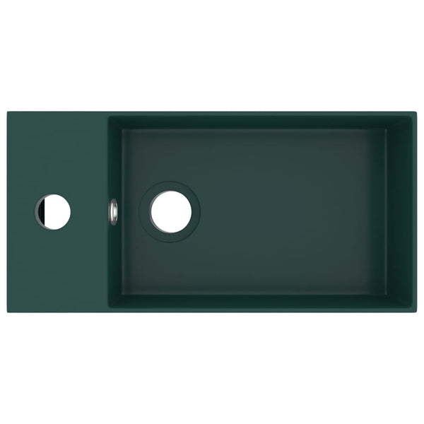 Kylpyhuoneen pesuallas ylivuodolla keraaminen tummanvihreä