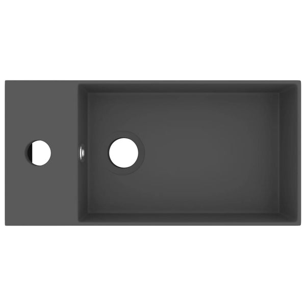 Kylpyhuoneen pesuallas ylivuodolla keraaminen tumma harmaa