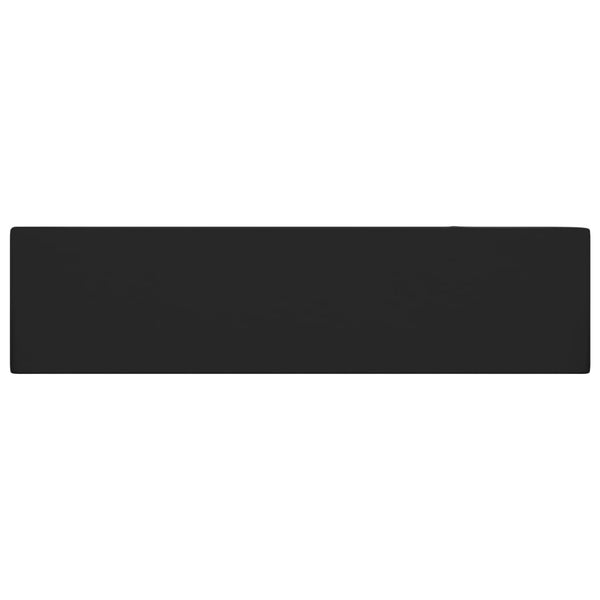 Kylpyhuoneen pesuallas ylivuodolla keraaminen matta musta