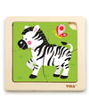 Pehmeäpintainen zebrakuosinen palapeli pöytäalustalla.