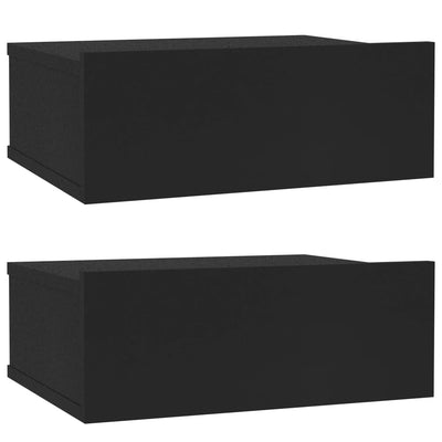 Kelluvat yöpöydät 2 kpl musta 40x30x15 cm tekninen puu