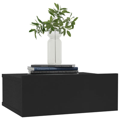 Kelluvat yöpöydät 2 kpl musta 40x30x15 cm tekninen puu