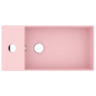 Kylpyhuoneen pesuallas ylivuodolla keraaminen matta pinkki