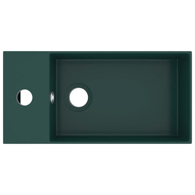 Kylpyhuoneen pesuallas ylivuodolla keraaminen tummanvihreä