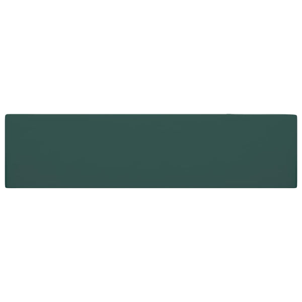 Tummanvihreä kylpyhuoneen pesuallas ylivuodolla keraaminen Amina