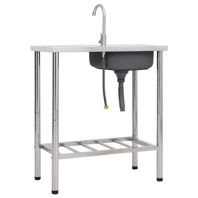 Ruostumaton teräs leirintäalueen pesuallas hanalla Alexandry