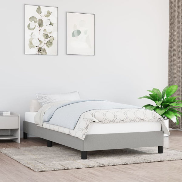 Ilman patjaa oleva vaaleanharmaa sängynrunko, koko 90x190cm Single, materiaali kangas