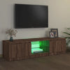TV-taso LED-valoilla ruskea tammi 140x40x35,5 cm