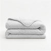 VUODEVAATTEET - Lazy peitto Uni Beige Tyynyliinoilla