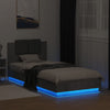 Sängynrunko päädyllä ja LED-valoilla betoninharmaa 100x200 cm