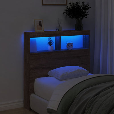 Sängynpäätykaappi LED-valoilla ruskea tammi 100x17x102 cm