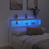 Sängynpäätykaappi LED-valoilla valkoinen 140x17x102 cm