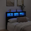 Sängynpäätykaappi LED-valoilla musta 140x17x102 cm