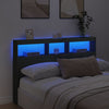 Sängynpäätykaappi LED-valoilla musta 160x17x102 cm
