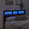 Sängynpäätykaappi LED-valoilla ruskea tammi 160x17x102 cm