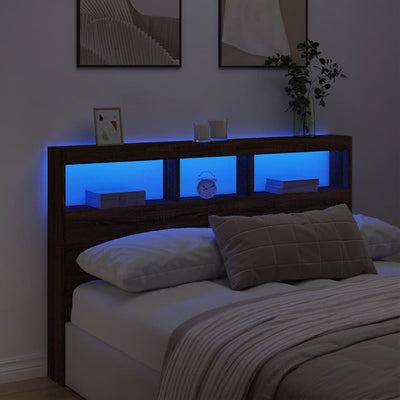 Sängynpäätykaappi LED-valoilla ruskea tammi 160x17x102 cm