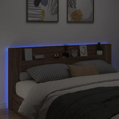 Sängynpäätykaappi LED-valoilla ruskea tammi 220x16,5x103,5 cm