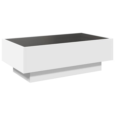 Sohvapöytä LED-valoilla valkoinen 90x50x30 cm tekninen puu