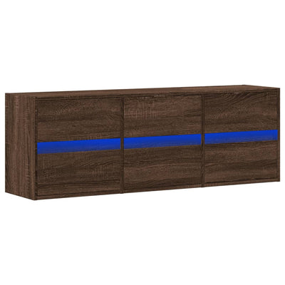 TV-seinäkaappi LED-valoilla ruskea tammi 130x31x45 cm
