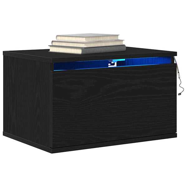 Seinälle kiinnitettävä yöpöytäkaappi mukana Musta tammi.