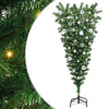 Ylösalasin oleva keinopuumyChristmas-puu, jossa on pallosetti