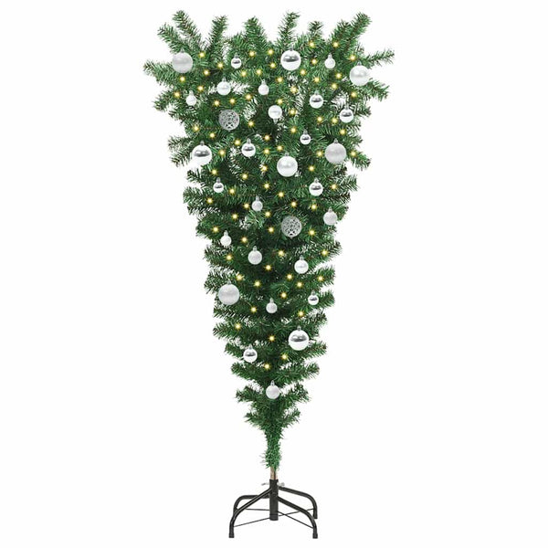 Ylösalasin oleva keinopuumyChristmas-puu, jossa on pallosetti