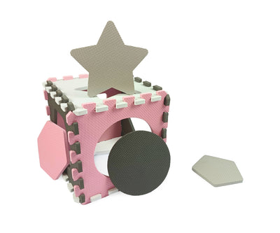 Pinkki-harmaa vaahtomuovipalapeli 4x4 muotoa.