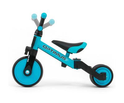 Milly Mally Ride-On Bike 3in1 Optimus Blue -kolmipyöräinen lapsille. Sininen pyörä, jossa on ergonominen muotoilu, tukeva runko ja säädettävä istuin. Sopii lapsille, jotka opettelevat tasapainoa ja pyöräilevät ensimmäistä kertaa.