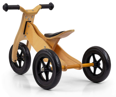 Kuvassa on Cool Natural -niminen 2-in-1 -lastenvaunut ja potkupyörä, jossa on musta runko ja punaiset yksityiskohdat.