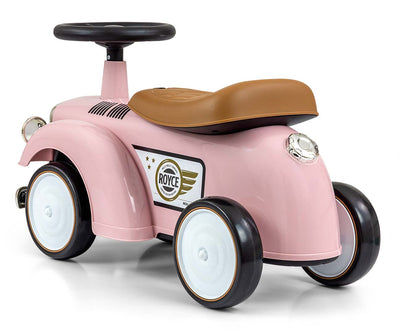 Vaaleanpunainen leikkiauto Rolls-Royce-tyylisellä designilla.