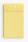 Bobono - Muotoonommeltu froteelakana 120x60 cm - keltainen