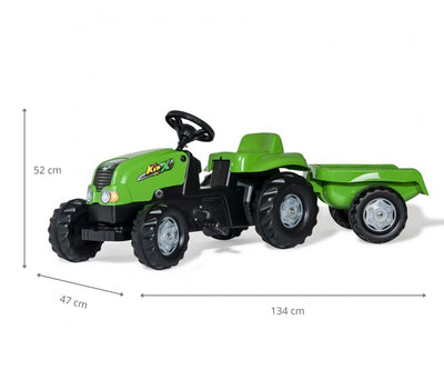 Vihreä Rolly Toys -traktori lasten perävaunulla.