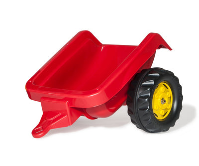 Punainen Rolly Toys -traktori lapsille, jossa on kauha ja perävaunu.