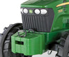 Rolly Toys -merkkinen traktorilelu, malli Rolly Farmtrac John Deere 7930, väriltään vihreä ja keltainen.