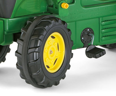 John Deere -merkkinen Rolly Toys -traktori, malli 7930, punainen traktorin kauhalla.