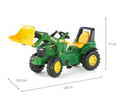 Punainen Rolly Toys -merkkinen traktori, malli Rolly Farmtrac John Deere 7930, varustettuna etukuormaajalla.