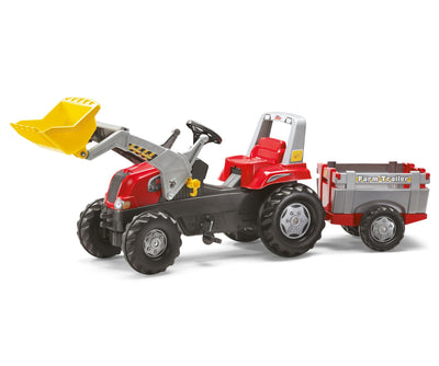 Punainen Rolly Toys traktori juniorikokoisella perävaunulla ja lapiovarustuksella.