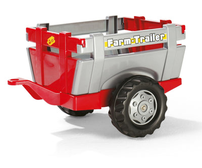Punainen Rolly Toys 811397 traktori Rolly Junior RT -prätkä ja kauha.