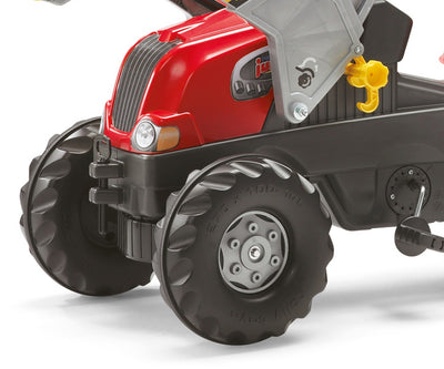 Punainen Rolly Toys 811397 -traktori Rolly Junior RT -prässi ja kauha.