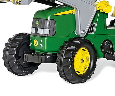 Rolly Toys -merkkinen traktori, Rolly Junior John Deere, keltaisena. Mukana kauha ja perävaunu.