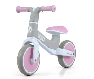 Vaaleanpunainen Velo-merkkinen juoksupyörä.