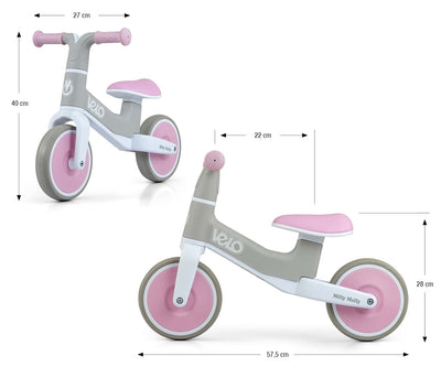 Kuva pinkistä Velo-merkkisestä potkupyörästä lapsille.