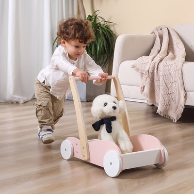 Vaaleanpunainen lasten kävelyapuväline Mini Mover.