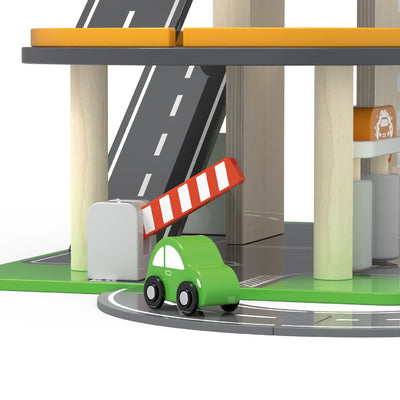 Kaunis ja moderni kolmikerroksinen leikkigarassi, jossa on autopesula ja hissi.