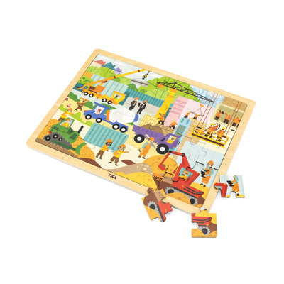 Puzzlen palapeli, jossa on 48 osaa. Teemana rakennuskoneet.