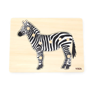 Pehmeä pohjamatto, jossa on kahvat ja zebrakuvio.