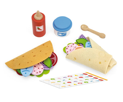 Ruostumattomasta teräksestä valmistettu neljän osan taco-tarvikesetti. Setti sisältää kaksi taco-telineitä, tacoleikkaajan ja tacorullan.