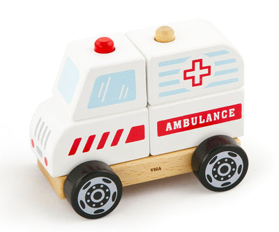 Punainen ambulanssi-leikkikalu, jossa on pyöristetyt kulmat ja keltaiset yksityiskohdat.